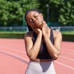 Woman feeling pain in neck
