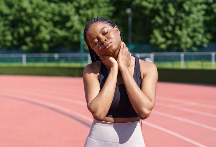 Woman feeling pain in neck