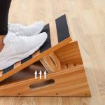Slant board exercise - woman's feet on a slant board