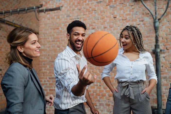 basketball professionals having fun with ball