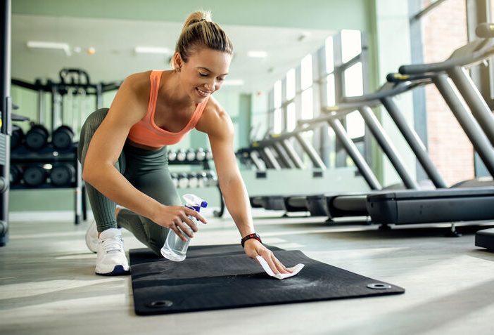 Woman remove smell from mat
