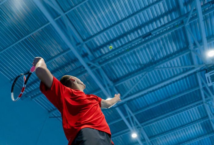 Momentum Used in Badminton - man playing badminton