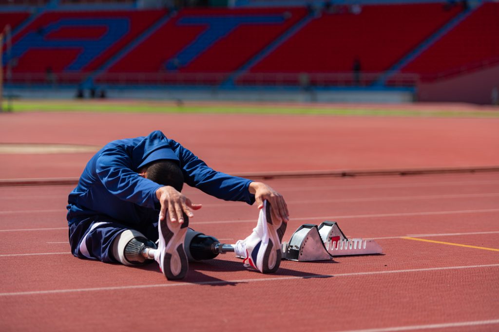 Man feeling pain after workout